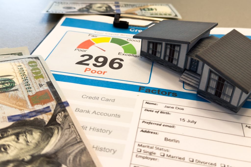 paper house with credit report letters